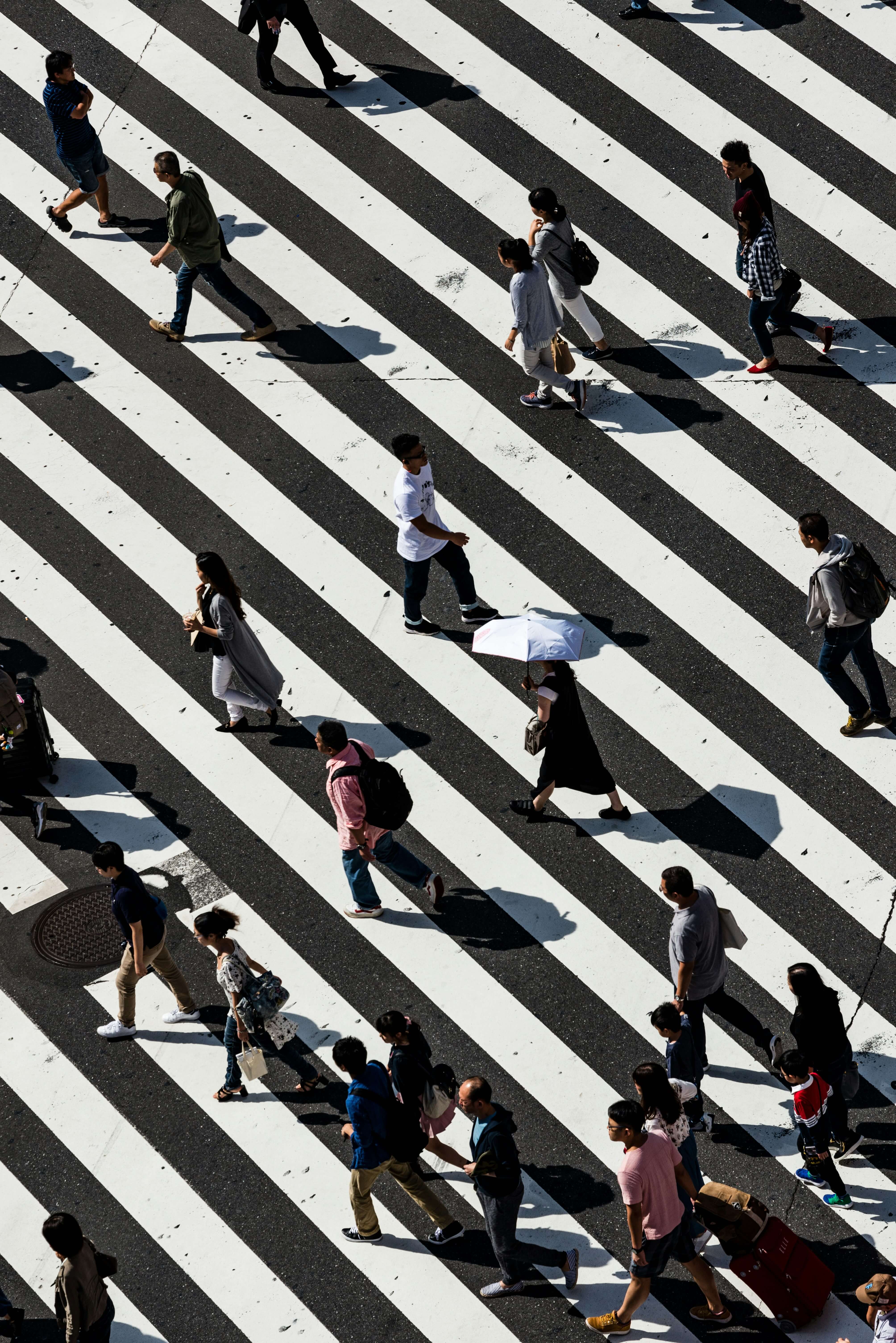 people crossing an intersection